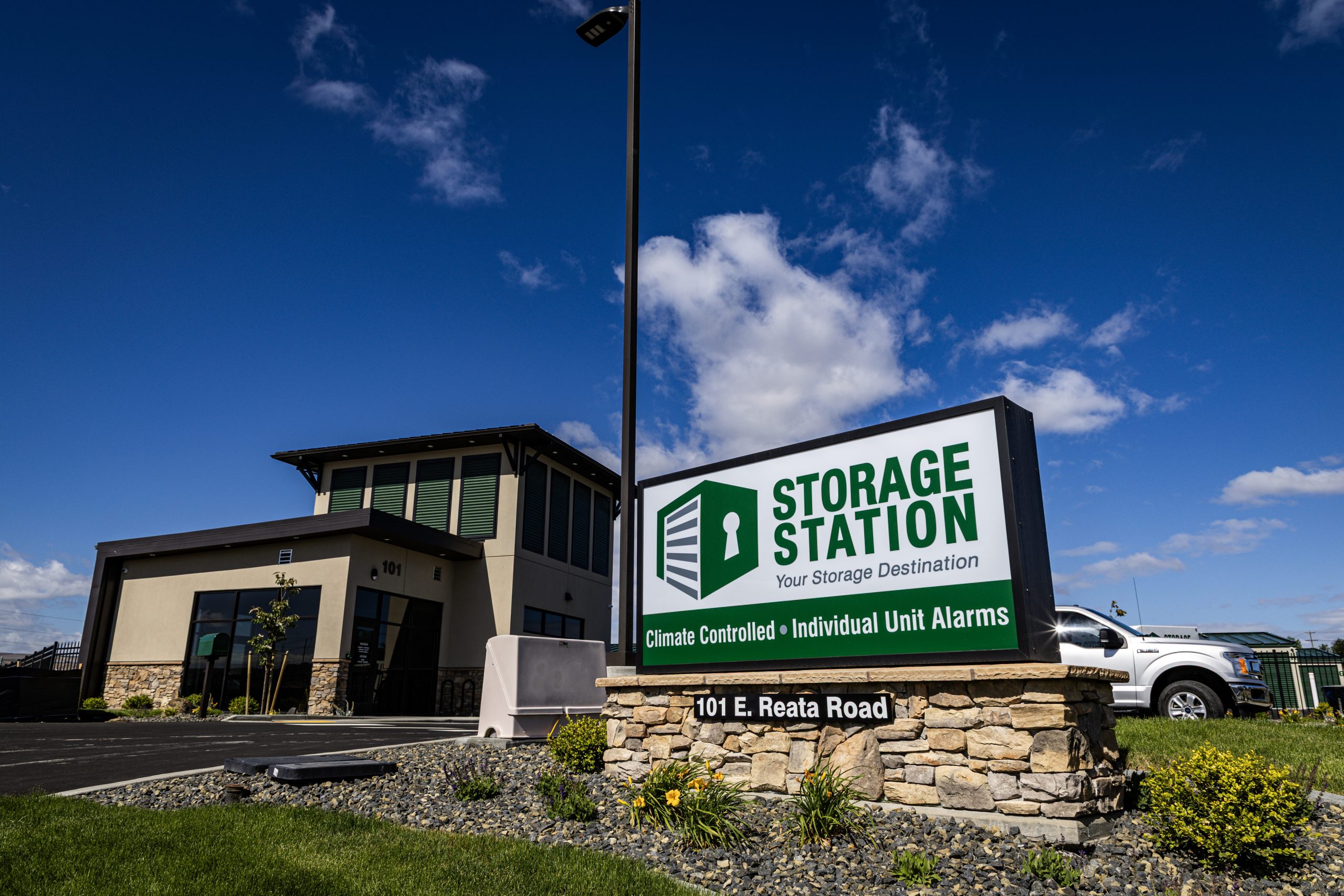 Storage station building and sign